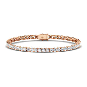 A rose gold tennis bracelet with a row of sparkling round-cut diamonds and a secure clasp.