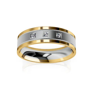 A two-tone ring with gold edges, a silver center band, and three small embedded diamonds.