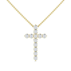 Gold beaded chain necklace with a cross pendant made of round, sparkling clear gemstones.